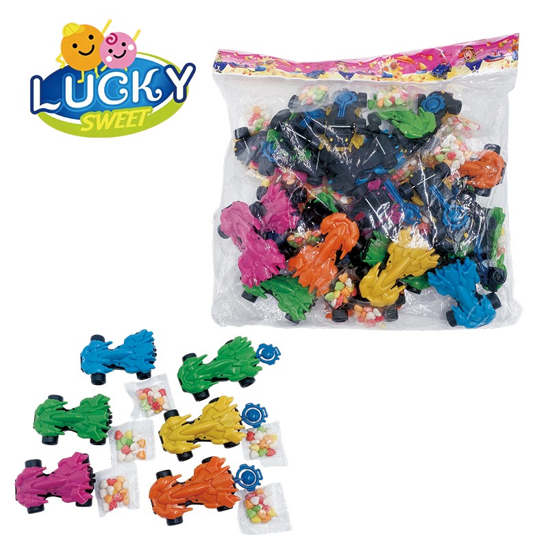 Spring-loaded 4WD toy car with pressed candy